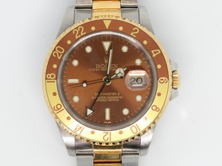 トケマー :: ROLEX / ロレックス :: GMTマスター :: 逸品! ROLEX ロレックス GMTマスターⅡ 16713 A番 ブラウンダイアル 茶×金ベゼル 茶色文字盤 中古A ﾒﾝｽﾞ 自動巻き (164362)